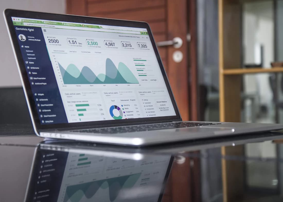 Campaign analytics charts on a laptop