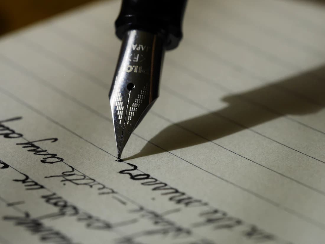 Writer drafting content by hand